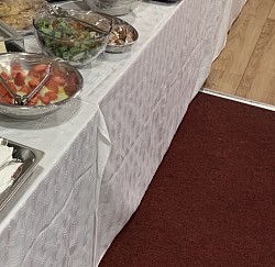 Our buffet, each tray offers a different selection of foods..