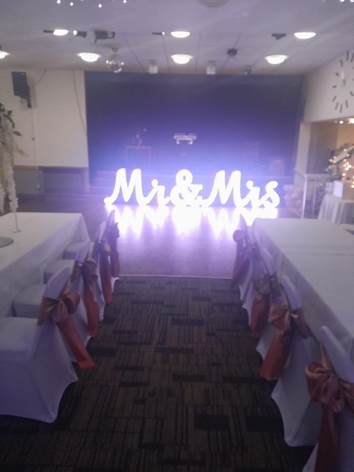 Mr and mrs hire signs.